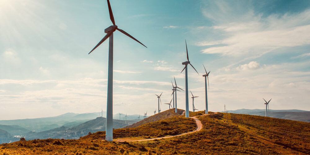 Wind,Turbines,On,Beautiful,Sunny,Summer,Autumn,Mountain,Landsape.,Curvy